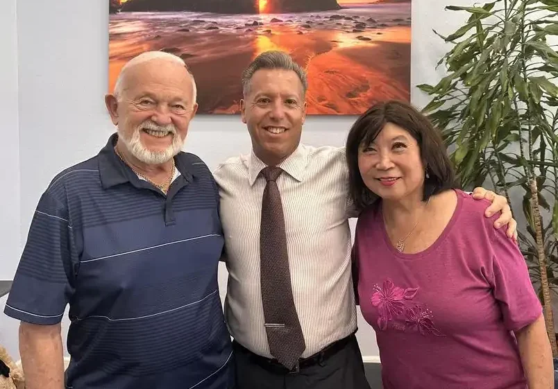 Chiropractor performing spinal adjustment therapy on patient – On Purpose Chiropractic